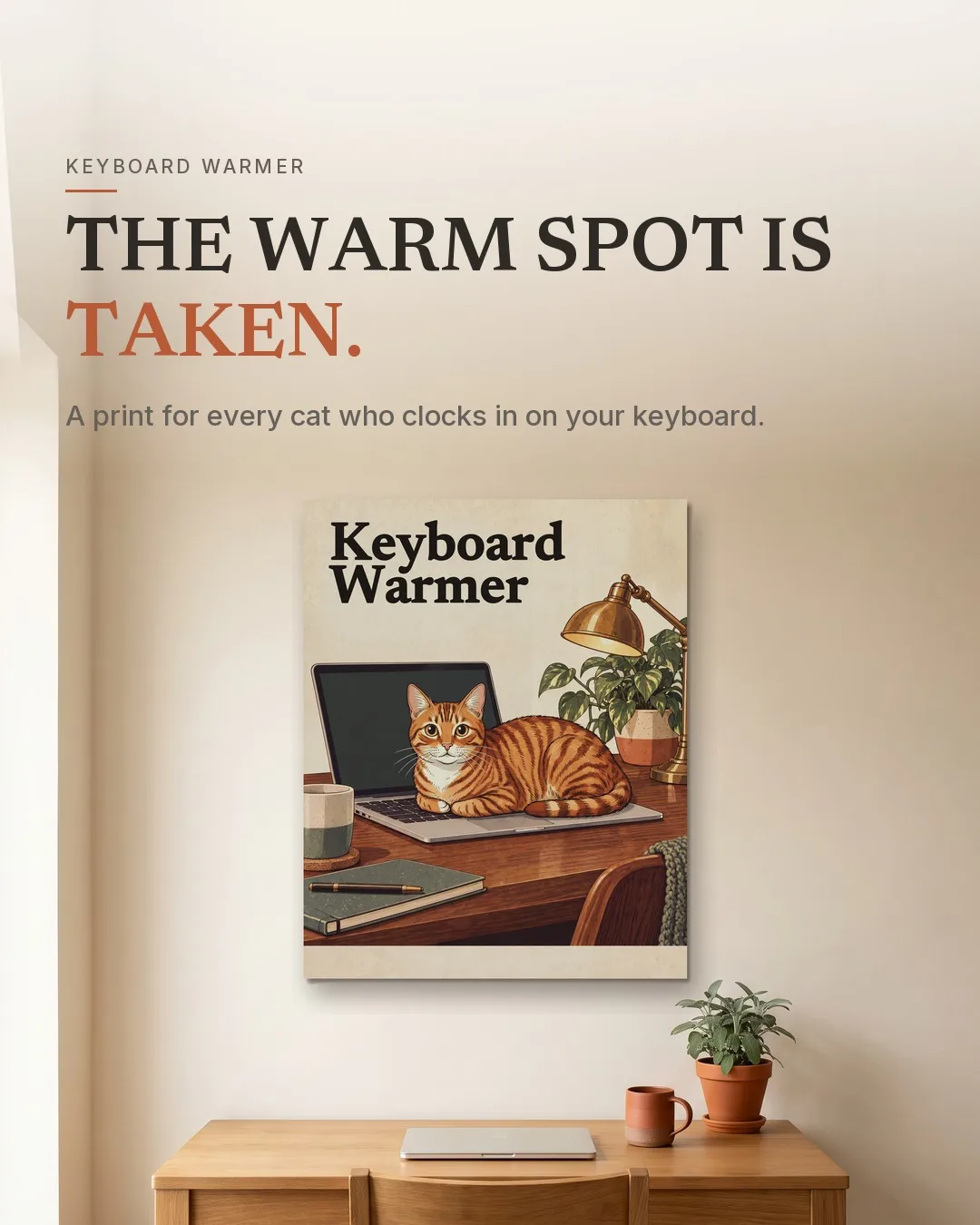 The Keyboard Warmer: the framed print hanging on a wall in a room.